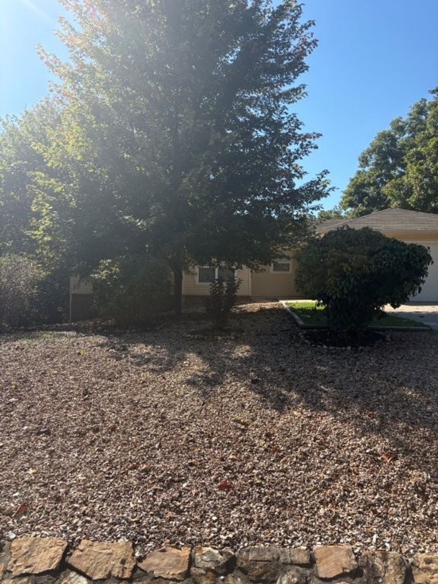 Cozy Home in Bentonville School District! This 2-bedroom, 2-bath home has so much to offer with 1,108 sq. ft. of comfortable living space. Sitting on a 0.26-acre lot with beautiful mature trees and charm, you’ll love the additional office and sunroom. Fresh paint throughout makes it move-in ready, and there’s even a storage shed for your tools and outdoor gear.  Qualifies for RD financing. Don’t wait—schedule your showing today!