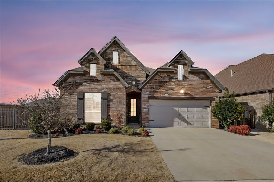 Welcome to this beautifully maintained one-level home in the sought-after Brighton Cottages at The Parks in Bentonville. Built in 2018, this 3 bedroom, 2 bath home offers 1,926 heated sq ft with a desirable split floor plan. The open layout features wood flooring, gas log fireplace, lots of windows and abundant natural light. The kitchen includes herringbone tile to the ceiling, granite countertops, walk-in pantry, gas cooktop, and a built-in oven.  The private primary suite offers a walk-in closet, en-suite bath and a spacious walk-in closet. Enjoy outdoor living on the covered patio overlooking a fenced, professionally landscaped backyard. No homes directly behind.  Additional highlights include a 2-car attached garage & wired-for-sound. POA amenities include lawn care and the clubhouse, pool, park & playground located steps away from the backyard. Convenient to the Bentonville Community Center, Willowbrook Elementary, Bright Field Middle School, Fulbright Junior High and all that Bentonville has to offer.