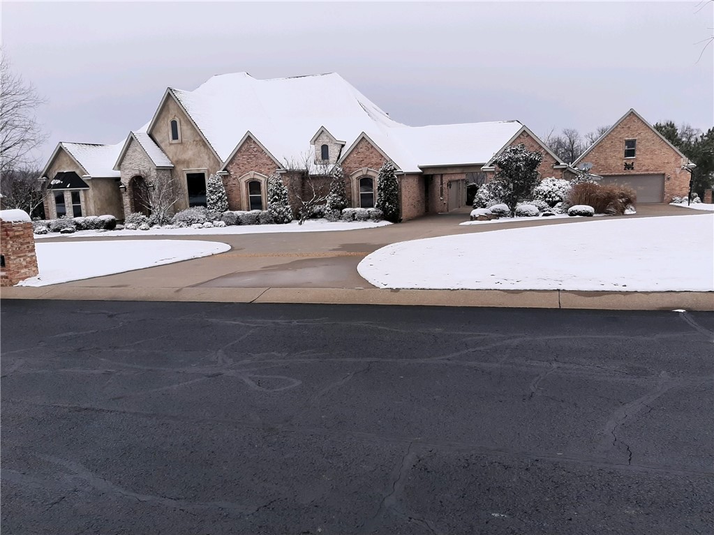 Located in Churchill Downs, a gated community, this exquisite estate home with a swimming pool is situated on over 2 ¼ acres. The main house is approximately 4350 square feet with a 3-car garage and an additional, detached 2 car garage/workshop with a second level. Across the breezeway from the main house is a 350 sq ft heated & cooled guest house with a full bath. The home’s main level includes an open floor plan, office, formal dining room, powder room, utility room, butler's pantry, primary bed/bath suite, additional bedroom with a private bath & 2 other bedrooms sharing a Jack and Jill bath. Upstairs, is a bedroom/ bonus room, half bath and another bonus room. This stunning home has many elegant features including: recently painted, hardwood floors, granite countertops, gas range, lots of windows, woodburning/gas fireplace and built-ins. You will love the refreshing pool, covered back porch and the spacious backyard. Showings to start on WEDNESDAY, March 1, 2023. Professional photos to be taken next week.