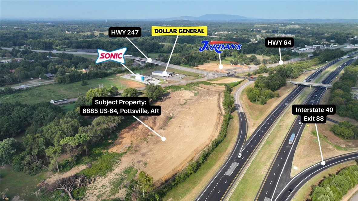 Prime commercial development opportunity with high visibility on I-40 and Highway 64. Lot is cleared and ready for your business! 6+/- acres zoned C-3 with approximately 985' of I-40 road frontage/visibility; and 1,137' of HWY 64 road frontage/accessibility.