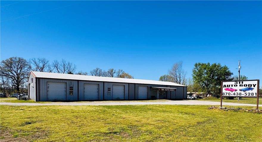 Rare opportunity to own a versatile commercial property on 12 acres conveniently located near Green Forest with a proven history of success. The approx. 5,200 sq ft insulated metal building, formerly 311 Body Shop, includes office space, paint booth, and shop area with vehicle lift—ideal for a variety of business uses.

Additional residential structures offer strong mixed-use potential. The main home (approx. 1,282 sq ft, 2 bed, 2 bath) and second structure (approx. 1,088 sq ft with plumbing and electric) need renovation but could serve as rentals. A tenant-occupied single-wide (approx. 1,064 sq ft) provides immediate income; showings by appointment only.

Property features a pond, spring, scenic views, and room to expand or divide. Equipment available separately. Owner prefers to sell as a whole but may consider division.

This property is also being offered Residential see MLS 1341866