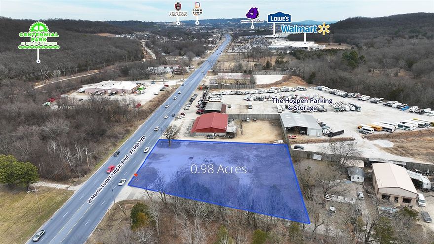 Great development potential on 0.98 acres of commercial land off bustling W Martin Luther King Jr. Blvd in Fayetteville, Arkansas. Situated between nationally recognized retail such as a Walmart Supercenter and Lowe’s. Centennial Park and future middle school campus are within a short drive as well as the University of Arkansas campus and Fayetteville High School. Location provides great convenience to commuters from Farmington and Prairie Grove and is in a direct path of growth.