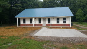 UNDER CONSTRUCTION!! Brand New 4 Bedroom 3 Bath open floor plan, with large front porch & back porch. Home will have Vinyl & Brick exterior with metal roof. Vaulted ceilings, walk in closets, & laundry room. Also has a 30x30 shop. Home should be completed in the spring of 2017!