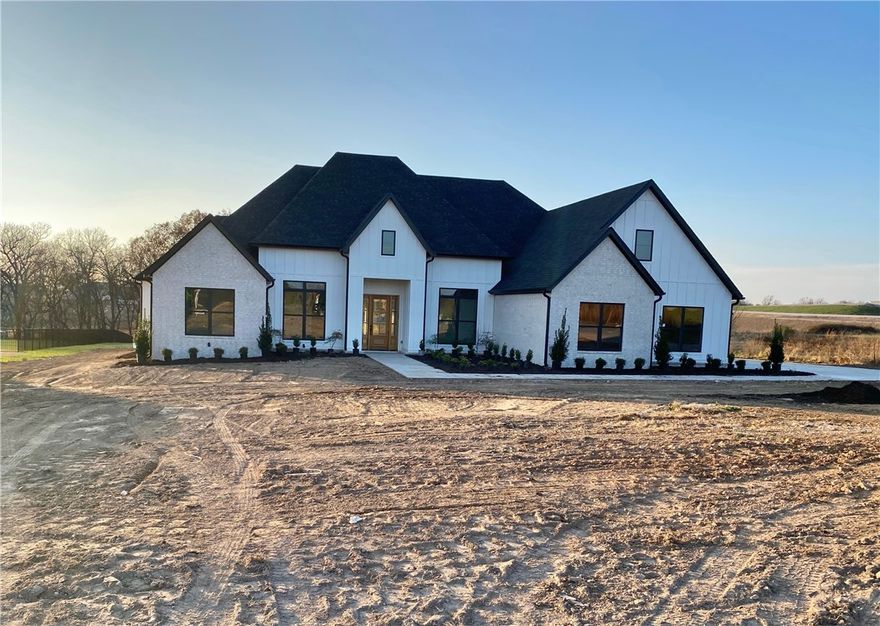 Dreaminess and Location in one home! This charming new construction home is right near the new by-pass exit on 412!  A large lot at 1.74 acres, this beautiful property offers 5 bedrooms plus an upgraded office, 3.5 baths, and 3553 sq ft of thoughtfully designed living space! Being at the end of the street it feels open and spacious.  As you enter the home you are met by a vast  vaulted wood ceiling! On your right the gourmet kitchen includes 10’ full-height custom cabinets, a natural gas range, large island, and exquisite attention to details. The primary suite offers a large soaking tub, tile shower, his/her vanities, and a large walk-in closet. From the central vacuum system to built ins- there are upgrades everywhere! The covered back porch is welcoming and open, perfect for enjoying the back yard. Come see this stunning home!