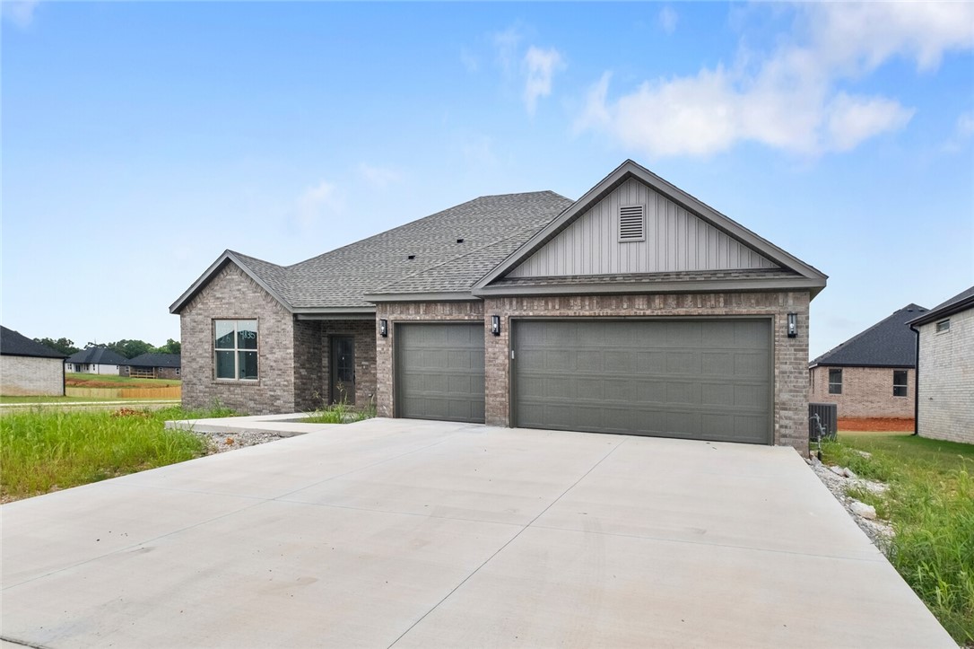 Welcome to Spring Creek Farms, located in the heart of NWA (Cave Springs/Elm Springs). There is something for everyone! A pool, playground & walking trails will be coming in phase 3. Shaw Elementary is just steps away. Enjoy pickleball, tennis, walking trails & more at nearby Shaw Park. This neighborhood has spacious lots with many backing up to green space. Call for more details & options available. One-level, 4-bed, 3-bath layout with an office/flex space designed for modern living. Features include: 3 car garage, open floor plan, vaulted ceiling with beams, gas log fireplace, quartz countertops, soft close custom cabinet & drawers, gas range with fully vented hood, built-in microwave, and pantry. The primary suite features a tray ceiling with beams, dual vanity, a walk-in shower & a free-standing bathtub for the ultimate spa-like experience. A large back covered patio is complete with internet and gas hookups, ready to entertain.
Full wood privacy fence and gutters are included!