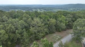 This 1.7 acres looking over the River Valley awaits your dream home. Lot features mix of hardwoods and over looks Lake Dardanelle. An absolute dream for someone wanting to build their home!