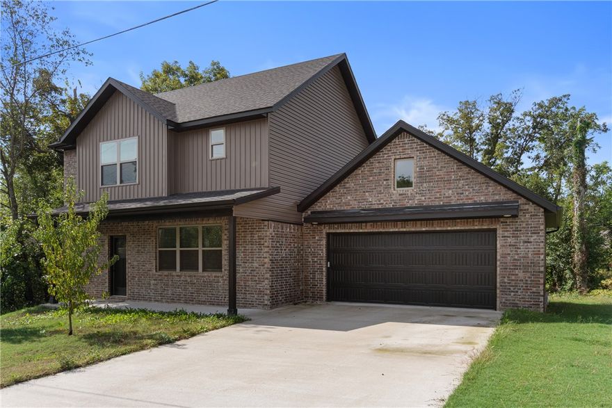 **2 BD SEPTIC** Well-maintained two-story home. All bedrooms and full baths are located upstairs, including a spacious primary suite with a walk-in closet, dual vanities, and a walk-in shower. The main level features an open-concept living room, kitchen, and dining area, along with a half bath, making it ideal for entertaining. Enjoy outdoor living with a flat yard, flower garden, thornless blackberry and raspberry bushes along the back deck, and two peach trees in the front yard (trees expected to produce in 2026). Located less than 5 minutes from Lake Loch Lomond, Tiree Park, and Hwy 49. Peaceful setting with convenient access to local amenities.