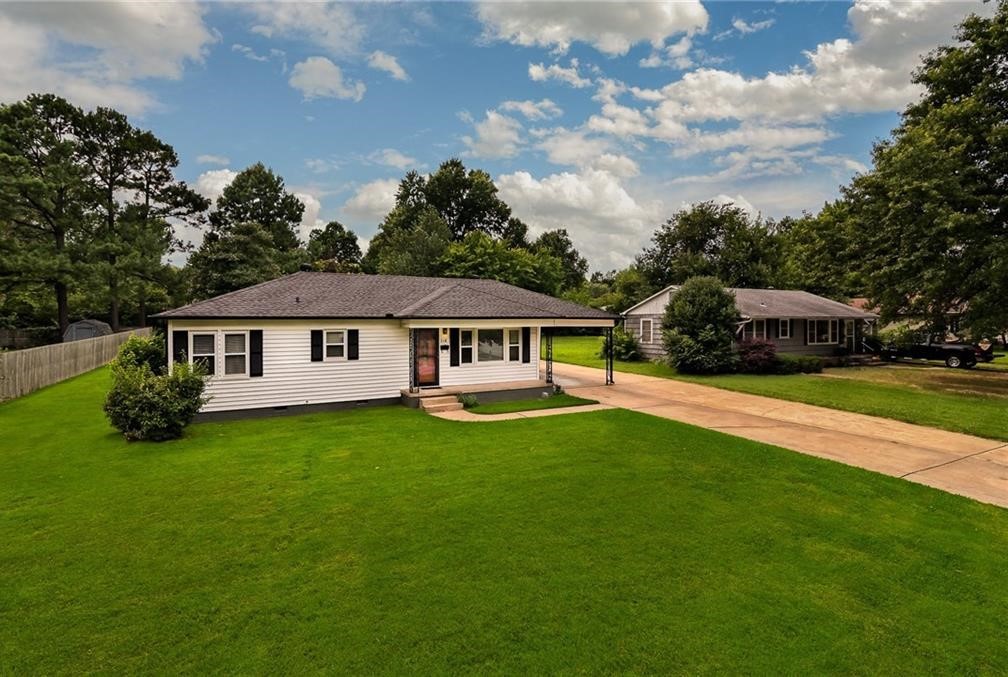 Rent includes lawn care and it's a nice big yard! This charming home has been completely renovated with top of the line amenities. Located near enough to walk to Murphy Park, Springdale Aquatic Center, Springdale Public Library and schools. 20 minute walk to Downtown Springdale too!
Beautiful resurfaced hardwood floors, newer HVAC, new windows, and doors. This home is immaculate! Home is on a large lot with outbuilding included as well.
No smokers, dogs are negotiable.
AGENT OWNED