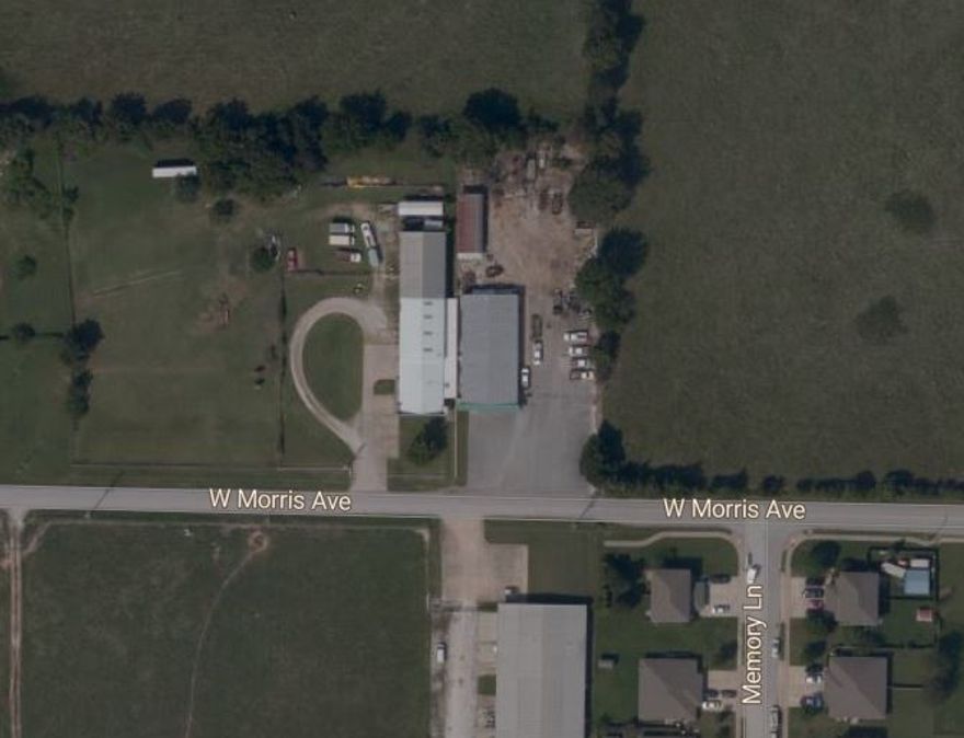 Commercial Building with acreage.  Sold before print