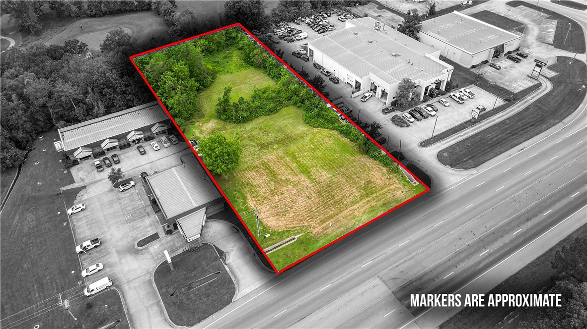 Prime 1.5-Acre Commercial Lot – High-Traffic Location. Exceptional development opportunity located directly in front of the Springdale Country Club on US-71B (Thompson Street). This 1.5-acre lot offers outstanding visibility with an average daily traffic count of 24,000+ vehicles. Level and build-ready, this property is ideal for commercial, retail, or mixed-use development. Positioned in a high-growth corridor with convenient access to I-49, nearby residential neighborhoods, and established businesses. Zoned commercial—buyer to verify zoning and use with the city.