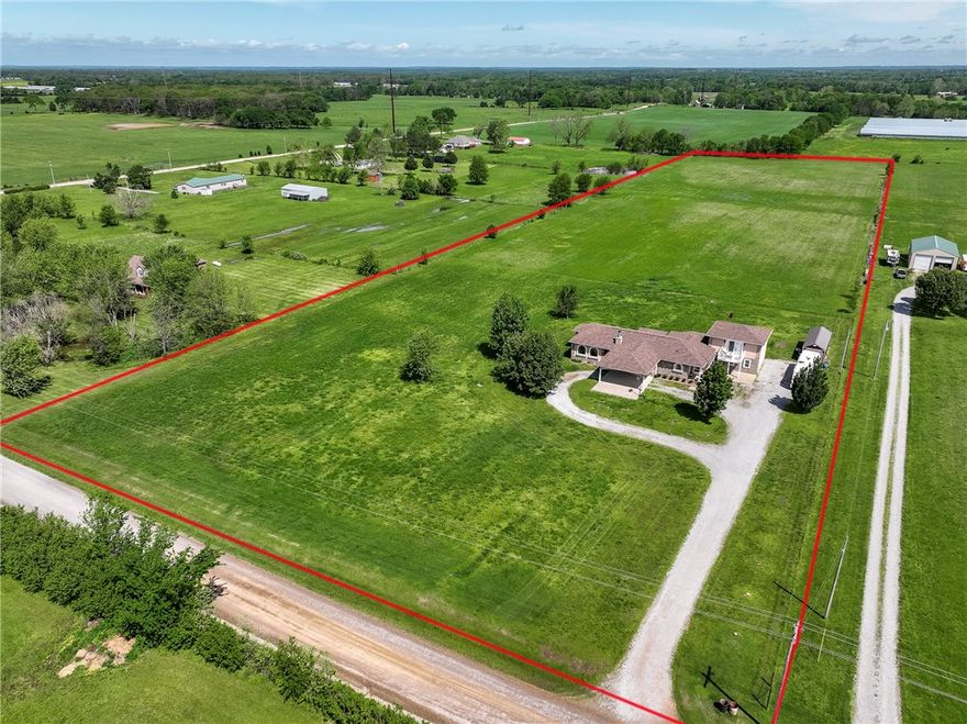 Wow! 10 Beautiful Acres + Custom-Built Home-designed with room for the whole family! This 5-bedroom, 3-bath retreat offers comfort, style, & functionality in every corner. Spa-Inspired Bathrooms: The primary suite features a luxurious tiled rain-head shower with additional wall jets. A stylish guest bath with unique design flair. A third bath with a jetted tub, including a shower. Gourmet Kitchen: An island with a gas range. Tons of cabinets, drawers, and pantry space. Room for formal dining plus a cozy breakfast area. Smart Storage: Four bedrooms include wood built-in dressers in the closets—perfect for keeping things neat and organized. Open, Welcoming Living Spaces: The entry-level family room is bright, spacious, and has high ceilings, a cozy fireplace ideal for gatherings. Upstairs, a large bonus room offers flexibility for a game room, studio, or office with stunning views. Serene Outdoor Living: Relax and unwind on the top deck overlooking your peaceful acreage—ideal for morning coffee or evening sunsets.