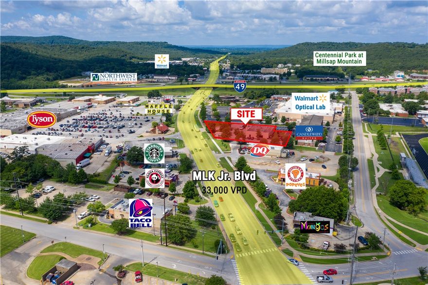 Located within 1 mile from the University of Arkansas.  Great visibility from I-49 with approximately 250' of frontage on MLK.  Existing easement in place - request survey for additional details.