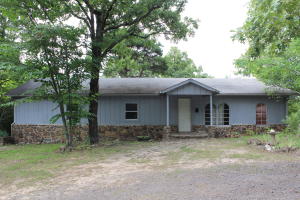 RETREAT...to your house located within walking distance of Piney Bay Recreation area. This cute house sits on 2.06 acres and is perfect for your full time or part time home. It has 3 bedrooms, 2 baths, and seller will leave all appliances, including a washer and dryer. There is a nice sized living room, dining room, and additional family room. The carpet is new in the living room, and the kitchen has been updated with new plumbing and cabinets. If you want to add a few more touch-ups, the seller will give a $1,000 bonus to you to help out. Call today. Get in this house before summer is gone.