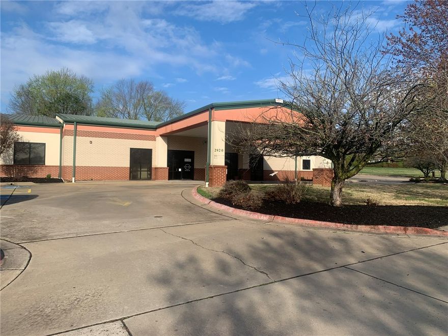 Daycare building for sale near S Thompson Street and the Tyson Foods Inc. corporate headquarters campus in Springdale, Arkansas. Building includes drop-off area and 24 parking spaces with outdoor fenced-in play area. The building includes multiple classrooms, kitchen and gym. Financials available by request.