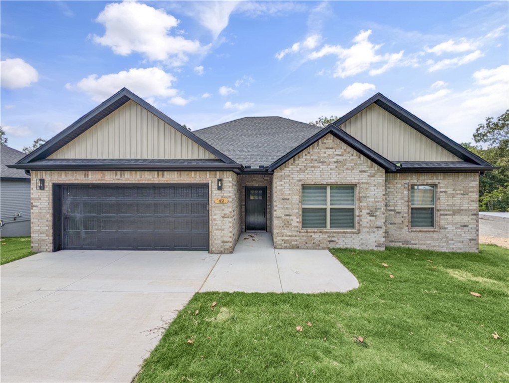 Welcome To Your Next Home! This Oneās Got The Look And The Layout ā A Fresh New Build With A Brick Front, 3 Bedrooms, Split Floorplan, And 9 Foot Ceilings Throughout That Open Up The Space. But The Real Star? A Vaulted Living Room Ceiling That Takes It To The Next Level (Optional Beams Available For That Extra Wow). The Kitchen Brings Major Function And Flair With Custom Cabinets, Granite Counters, A Tile Backsplash, Island With Bar Seating, Pantry, And A Spacious Dining Area Thatās Perfect For Gathering. The Primary Suite Feels Like A Retreat With A Dual Vanity, Tile Shower, And Walk-In Closet. Youāll Find Storage Galore Tucked Throughout This Home ā Because Every Inch Was Designed With Real Life In Mind. Step Out Back To A Covered Deck Overlooking A Fresh, Sodded Yard Framed By Peaceful Views. Thereās Still Time To Choose Finishes That Match Your Style! Photos From A Previous Build Of This Floorplan ā This Home Will Feature A Vaulted Ceiling And Unique Finishs. Under Construction Photos Are Of The Actual Home.