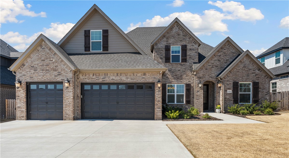 Step into style, comfort, and convenience with this almost-new (just under two years old!) home in the highly coveted Clarendon Heights neighborhood of Bentonville. Perfectly positioned near paved biking and walking trails, the community center, and the charm of Thaden Field, adventure and relaxation are always within reach. A quick commute to the new Walmart campus and easy access to top-tier dining and shopping make everyday living a breeze. Inside, an elegant main suite offers a serene retreat, while the open floor plan is designed for both function and flow. Need extra space? A versatile bonus room is ready to be your home office, gym, or library. Dine in style with a dedicated dining area, and enjoy the convenience of a spacious three-car garage. When it's time to unwind, cozy up by one of two fireplaces—indoors for a classic touch or outdoors on the screened-in patio for year-round ambiance. This home is where luxury meets lifestyle in the heart of Bentonville! Offers will be reviewed Tuesday morning.