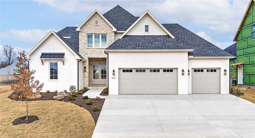 Welcome to the highly sought-after Aurora Subdivision, perfectly situated just minutes from the best of Rogers and Bentonville! Experience refined living in this beautifully designed David Harris home, offering 4 bedrooms with both the primary and guest suites conveniently located on the main level, plus 4.5 baths. Designed for both comfort and style, this home boasts an open layout with a chef’s kitchen, inviting living room with fireplace, and dining area. The second level offers a versatile bonus/5th bedroom, two additional bedrooms, a Jack-and-Jill bath, and a full bath. A generous covered patio extends your living space outdoors, opening to a beautifully level backyard.  Amenities abound in this incredible community, including an adult pool, family pool, bike repair station, dog park, elevated fitness course, sports court, open-air clubhouse, and playground. Internet is included in the POA!  Seize the opportunity to own a meticulously built David Harris home, perfectly placed in a prime location!