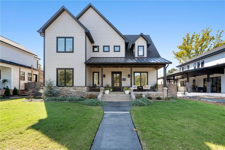 Sophisticated home for discriminating buyers! High demand Downtown Bentonville location, just off The Square. This home has been re-designed with modern, luxurious finishes and amenities.  Fully independent apartment above the 4 car garage is ready for your guests! The outdoor living spaces will "WOW" you with the entertaining possibilities, cooking features and cozy nooks to retreat to.  Enjoy the sunny primary suite on the main level with a spa-like bath and detailed closet. The office features a tongue and groove wood stained ceiling. Upstairs you will find an open family room with a sleek fireplace and kitchen/bar area, 3 extra-large bedrooms & 2 baths. The 2nd floor breezeway is a great place to meditate, do yoga or watch a game. Enjoy the fresh air, or simply close up the space and stay warm and cozy. The apartment features a private staircase from the garage or you can access through the 2nd floor breezeway. Come see this house soon, to choose your favorite space!