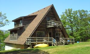 Mountainous Resort overlooking beautiful Blue Mountain Lake and abutting the Corp. of Engineers property. Perfectly balanced between grand views of the Ouachita Mountains to the South and the Lake and Mt. Magazine to the North. 3,000sqft, 3 bedroom, 3 bathroom, fully furnished home with all the comforts of the city, but in total serenity. Detached garage, and reasonably priced at $249,900.
