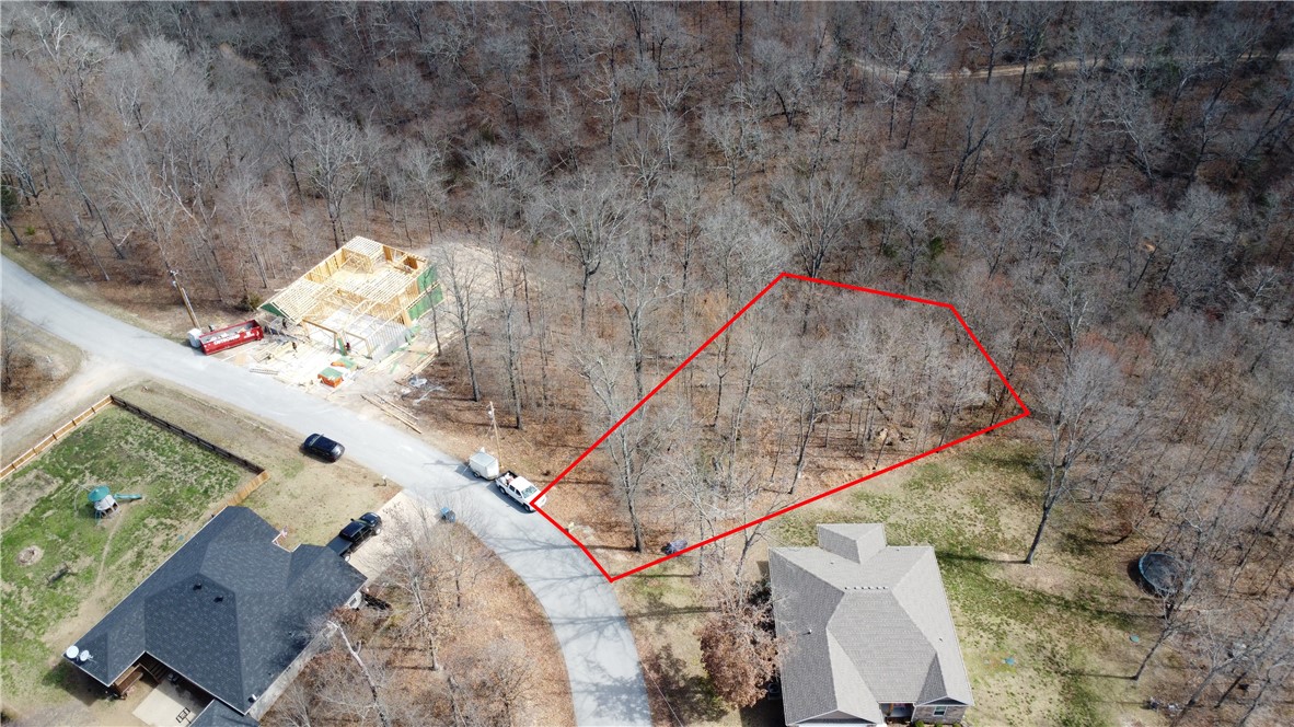 Bella Vista Lot in great location in Southwest Bella Vista very close to Highway 71 and I-49 and I-549. Very close to Down Under and Sunset Vista Mountain Bike Trail Access points.