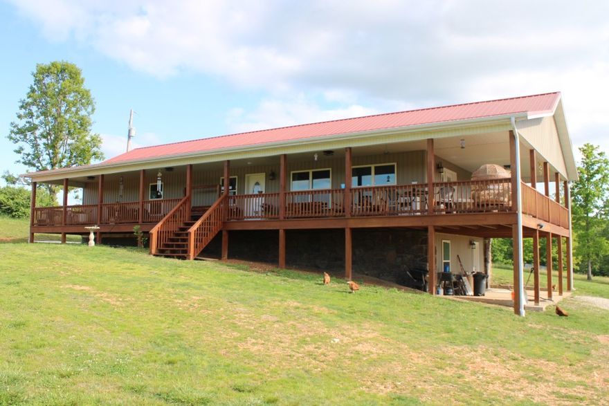 Spacious Home - Country Setting on 2.49 Acres - Wrap-Around Porch - enjoy relaxing views, sunsets, and cook-outs on this oversized covered porch!! Plus spacious home with huge 25 X 27 ft open and airy great room with lots of windows, vaulted ceiling, living-dining-kitchen areas and access to side porch for grilling. Home has large primary bedroom & bath with extra-large shower, walk-in closet, 3 bedrooms 2 full baths on main floor, walk-out basement includes 13x23 ft family room plus office area, 4th bedroom, 3rd bath and 2nd laundry area. Other features include LVP flooring though-out all of home, walk-in pantry just off kitchen and large laundry room with 6 ft counter-top & cabinet, central gas furnace, back up space heater, connection for gas fireplace in great room and connections for gas water heater in basement mechanical area. Located in Bergman Schools about 20 minutes from Harrison only 2/10 mile off paved road, Come See Today!!