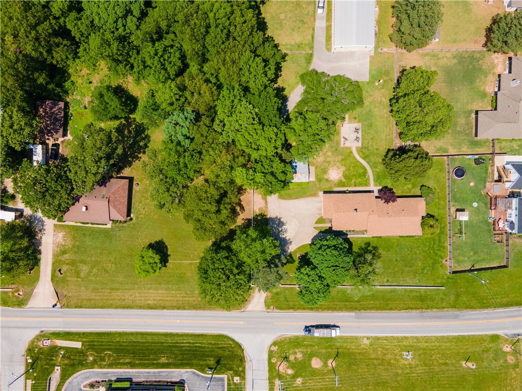 Commercial development potential located adjacent to Beau Terre Office Park within minutes of Downtown Bentonville, Walmart's New Home Office and Crystal Bridges Museum. Property also includes 3601 E Central Ave.