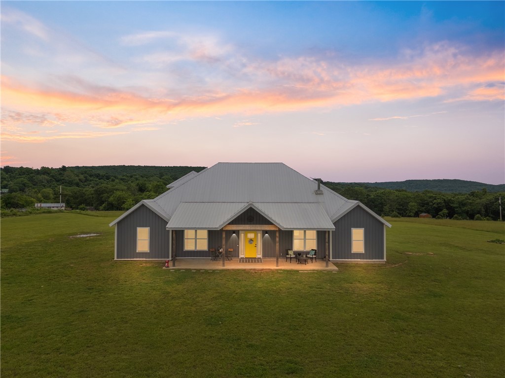 Welcome to your stunning, recently finished out, new home on 20+ beautiful pasture acres with amazing views! You'll love all of the modernization in the Gourmet kitchen w/ Café® smart double oven (WiFi, air fry), commercial grade fridge, and huge butcher block island is a chef's dream! All new Luxury Vinyl and tile flooring! Featuring a whole home water filtration system, 4 spacious bedrooms, massive laundry area and primary closets, newly finished bathrooms and lots of storage space. Gorgeous wood burning fireplace! Wired for whole-home generator and wired for heated floors. Plenty of space for horses, livestock, mini-farm and a garden with wire fence surrounding the property that includes an older walk-thru horse barn w/round pen!! This is where modern luxury meets country living! Best of both worlds! Schedule your showing today!