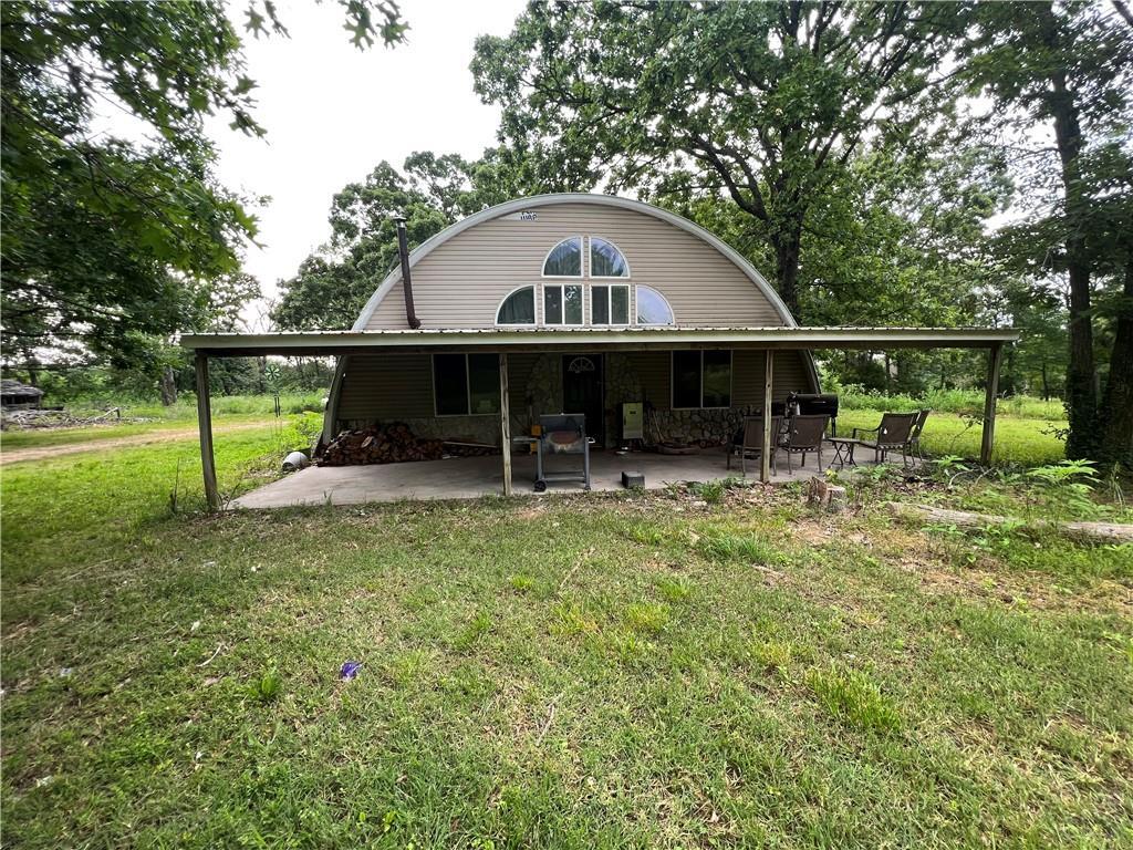 Country setting close to town! This would make someone a great starter home with TLC. Setting on a little over 2 level acres, with large shade trees and easy mowing. Home also includes a 450 square foot shop with basement/storm shelter. Home is being offered for sale AS-IS. Home does have a new Septic installed as well.