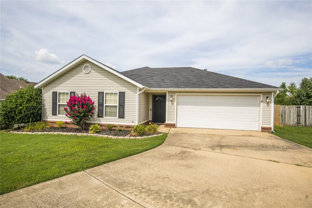 Great home on Cul-de-sac. Just minutes from Downtown Bentonville and trails. Newly updated 3 bedroom 2 bath home has gas fire place in living room wood flooring thru main living area and carpet in bedrooms. Stainless appliances. Covered patio with large fenced back yard. Refrigerator and washer/dryer included. All Lawn care, landscaping and lawn treatments included.