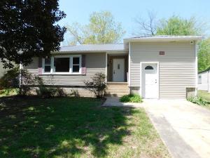 Convenient to Anywhere!! Great location in Harrison located near hospital and easy to travel anywhere in town. Home includes nice yard, shade trees, beautiful hardwood floors, new insulated windows and new metal roof plus extra space in utility room area for hobby room or work area. Concrete drive in front with extra access from alley and parking in back yard. Come see!!