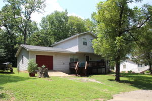 Nice home in town, close to banks, stores, and dining. Home is 3 bedroom 2 bath, has new kitchen cabinets and appliances. Master bath has been updated as well. Cooling and heating unit is less than 2 years old. There is a large master bedroom on the upper level.