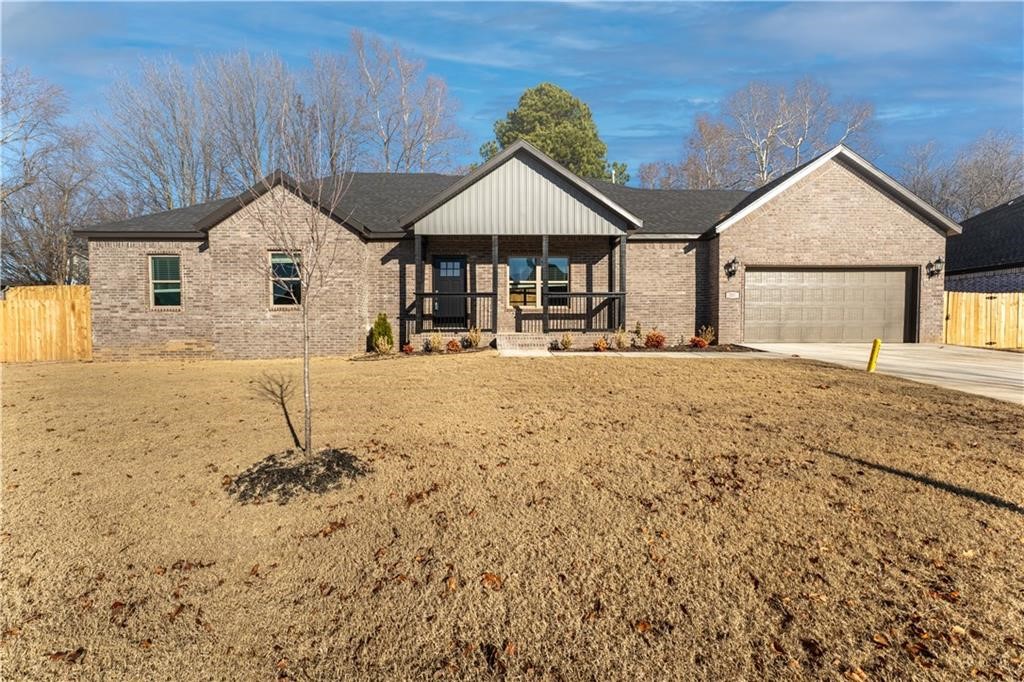 Like new 2023-Built brick home in new subdivision that was only lived in for a year! This 3 bedroom, 2 bath home features granite counter tops, an abundance of custom built cabinets, gas log fireplace in large family room, & walk in closets. LVP flooring in living areas that continues into your nice size master bedroom. Master bathroom includes a stand alone tub and a walk in tiled shower! Move In Ready!!