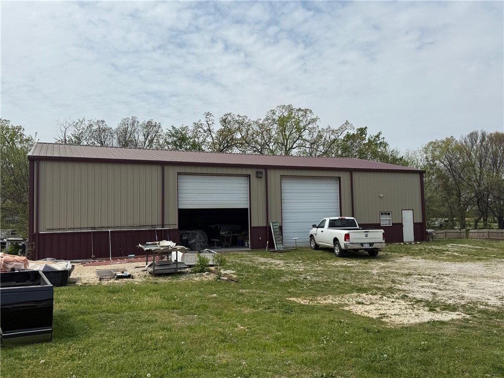 Hard to find flex space with two large roll up doors and yard space.