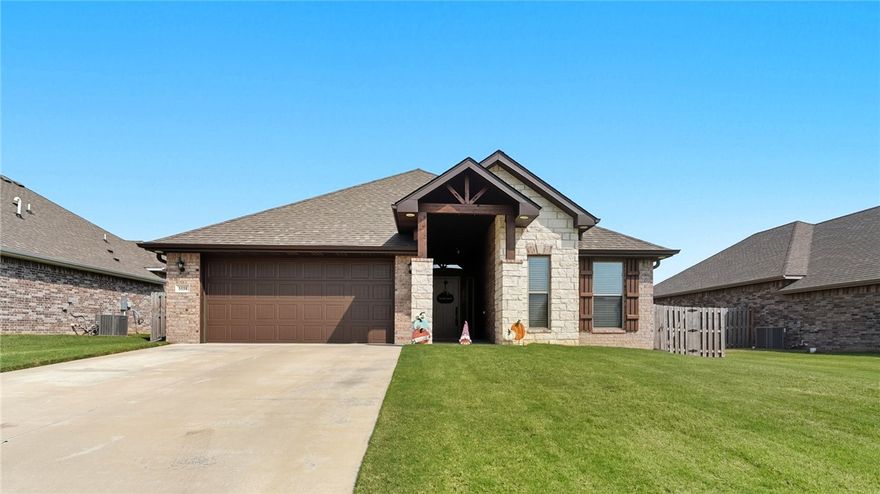 “My sellers relocation is your good fortune. This features a large open floor plan perfect for entertaining. Kitchen is open to the living space with a gas stove that will delight any chef. Lots of gleaming granite counter tops and plenty of cabinets to help you stay organized. Large pantry is divine. The fireplace is a lovely focal point and there is upgraded crown molding and trim work and lovely arched doorways which gives this home a luxe feel. Step outside on your covered back patio and enjoy the privacy of a fenced backyard- truly a wonderful place to relax after a long day. 4 bedrooms and large owners suite gives everyone space to enjoy quiet time to themselves. Beautiful street appeal plus a lovely subdivision which is conveniently located between the Elm Springs Exit and Wagon Wheel Road exit- go North or South to hop on I-49 in a jiffy. Ring Doorbell conveys to new owners.