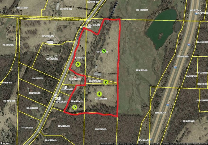Excellent development opportunity. Located across from the new planned sports park. 11,800 sf and 7,800 sf steel truss buildings