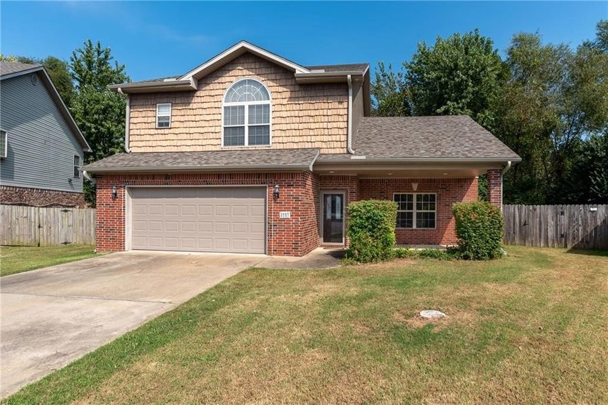 Introducing a charming 3 bedroom, 2.5 bathroom Bentonville home for lease. This spacious house features a kitchen island, wood floors, fenced back yard, fireplace, and a 2 car garage. The large master suite includes a jacuzzi garden tub for ultimate relaxation. Enjoy entertaining in the formal dining room or casual meals in the breakfast nook. The chef's kitchen is equipped with stainless steel appliances, perfect for cooking up delicious meals. With a large utility room complete with a sink, this home offers convenience and comfort. Don't miss out on the opportunity to make this beautiful Bentonville house your new home.