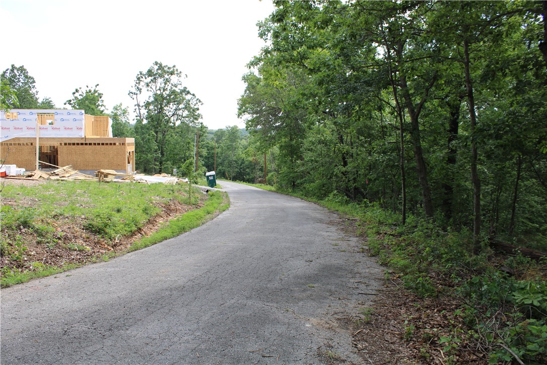 Residential lot in Bella Vista near Loch Lomond boat ramp. The lot is also conveniently located to all the other recreational lifestyle opportunities Bella Vista has to offer, including bike trails. Short commute into Bentonville and surrounding areas. Bring your dream home plans to this 0.34 +/- acre lot today!