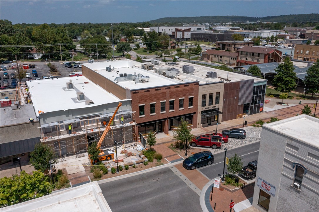 Office space located in the historic First Security Bank building adjacent to Walter Turnbow Park and the Razorback Greenway. The lease type is Modified Gross + utilities..