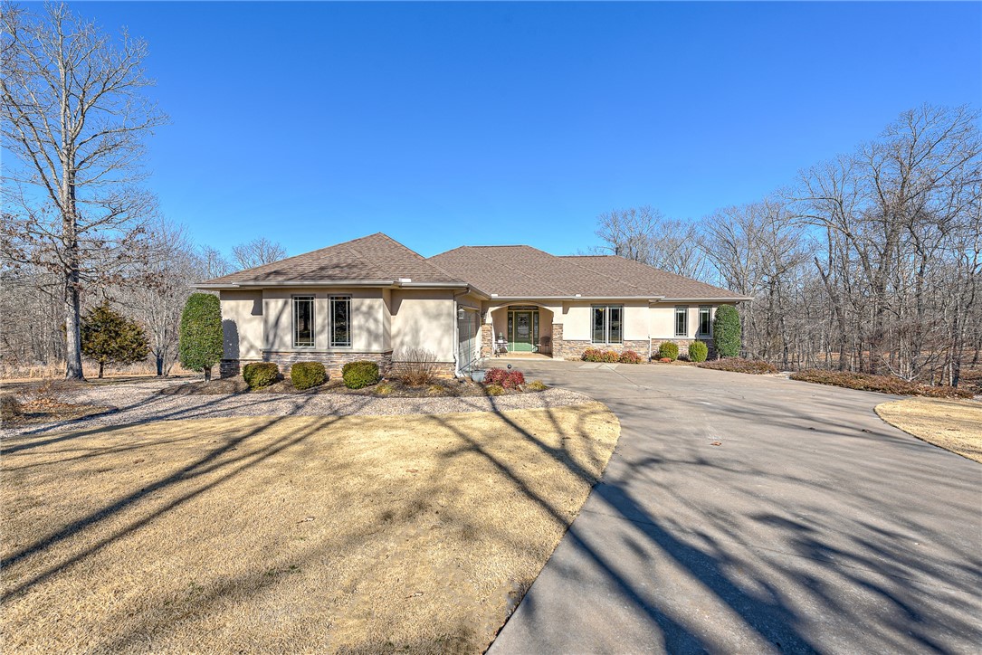 This home is located in the hard to find, rarely on the market, beautiful Highland Estates neighborhood. Sitting on 2.93 acres this meticulously maintained, one-owner home is flooded with nature and natural light in every room with large windows overlooking a private oasis that has been professionally landscaped. The kitchen has energy efficient appliances, corian counters and undermount sink. The oversized 2 car garage has ample storage and workspace. The unfinished walkout basement with 1/2 bathroom has so many possibilities for extra living space. Kitchen refrigerator conveys. New roof in 2019.