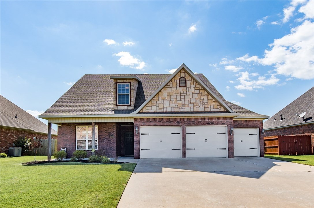 Very Nice Home! Ideal Location! Convenient to Rogers, Bentonville, Pea Ridge! All-Brick; Rock Trim. Large Back Yard. Peaceful View of Open Land behind House. Covered Patio. 4 Beds, 2.5 Baths. Formal Dining. New Carpet. Fresh Paint. Crown Molding. Tray Ceilings. All Bedrooms have Walk-In Closets. Master Bath has Jetted Tub & Walk-In Shower. Stainless Appliances; refrigerator conveys. Gas-Log Fireplace. Irrigation System. 3 Car Garage. 2 HVAC systems. Gas Furnace. Gas Water Heater.