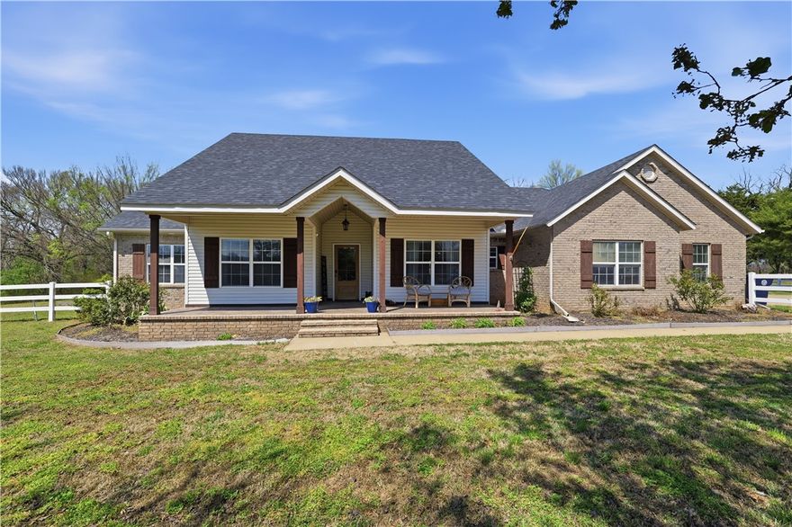 Prairie Grove on 3.57 acres with a 20'x40' pool, a 30'x40'shop (w/ductless system), and a lean-to (11'x40'), all on a culdesac location.  Can't beat this price and all that it offers. Brand new roof!  3 bed, 2 bath, AND DEDICATED OFFICE in this easy-living 1-story home. Just 2 miles from downtown Prairie Grove, the cutest small town and 15 minutes from Fayetteville.  This is paradise. The front porch faces the Ozark mountains and the back screened-in porch faces the salt water pool and woods (a very private lot).  Large deck with built in gas grill.  The shop has electric and was built in 2023.  Pool pump replaced in 2024; Pool built in 2015.  Corporate Relocation.