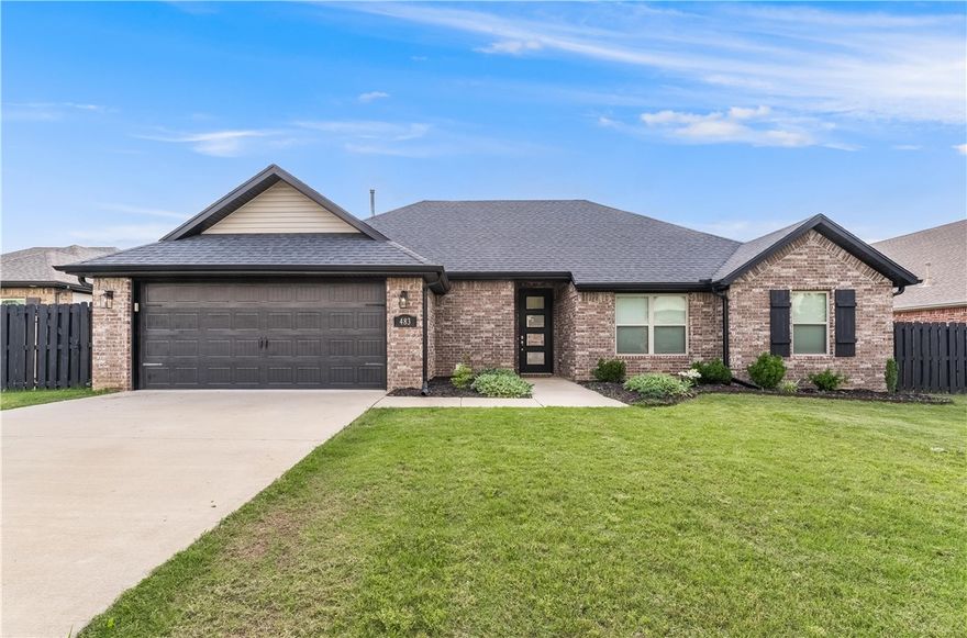 This beautifully maintained 4 bed, 2 bath home offers a bright and open layout designed for both comfort and functionality. Washer, dryer & fridge convey. The spacious kitchen features ample counter space and flows seamlessly into the main living area, perfect for entertaining or quiet family nights. Enjoy the privacy of a split floor plan, generous bedrooms, and a well-appointed primary suite. Step outside to a covered back patio overlooking a peaceful, fully fenced yard—ideal for morning coffee, weekend BBQs, or relaxing at the end of the day. Nestled in a quiet, friendly neighborhood just minutes from top-rated schools, parks, and everyday conveniences, this home is a perfect blend of modern living and small-town charm.