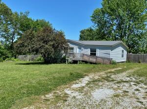 Fixer upper mobile, needs major work. On a 1 acre lot at end of the road. Home is vacant be cautious when showing, needs new flooring, selling ''as-is''