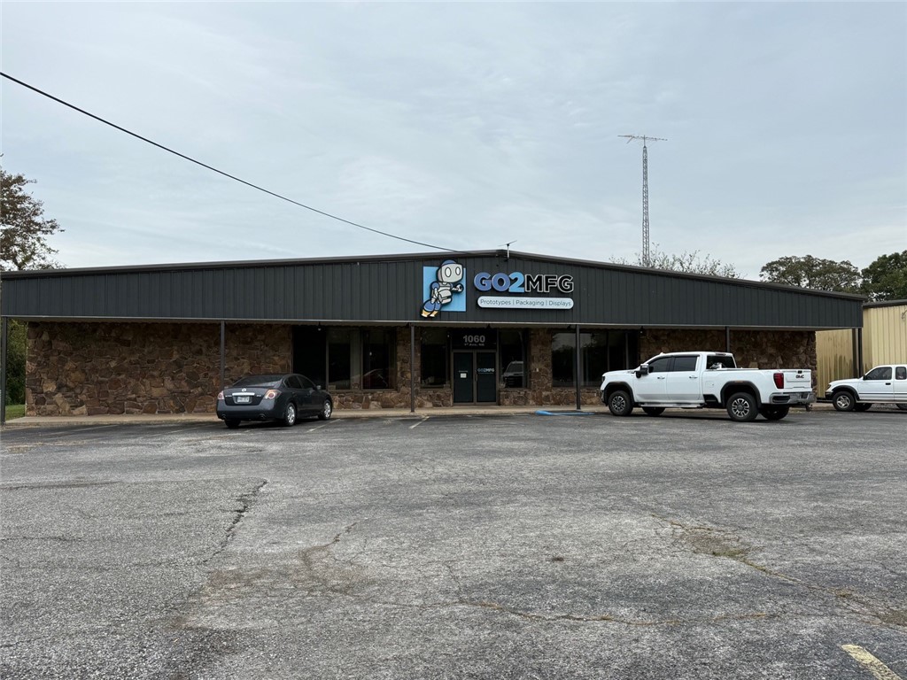 This well-conceived property features three interconnected buildings, joined by breezeways, each serving a distinct function that enhances flexibility and revenue potential:
1. Primary Building (~12,000 SF, climate controlled)
o Lobby, restrooms, offices, kitchenette, storage, and open display/assembly floor
o Ideal for light manufacturing, showroom, R&D, or hybrid usage
Property is available for sale see MLS 1324853
2. Large Open Warehouse (~9,700 SF)
o High-clearance space, loading dock, overhead door access
o Suitable for inventory storage, distribution, light fabrication, or logistics operations
3. Garage / Residential Component (~1,697 SF per level)
o Ground floor: four-bay garage / workshop
o Upper floor: carpeted apartment with 2 bedrooms, kitchen, living area, bath, laundry
o