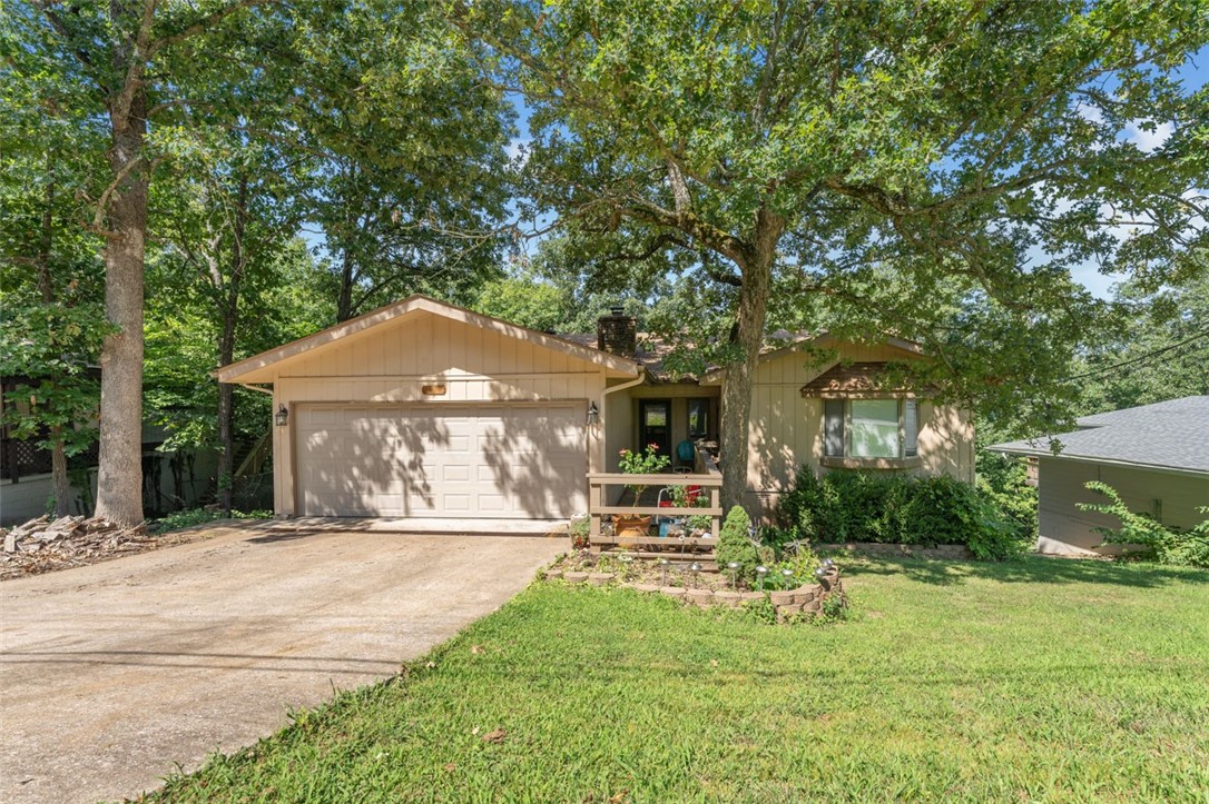 Move-in ready - recent roof - septic - and insulated Garage door - covered wood deck patio in back - close to everything Bella Vista has to offer. 1500 + sqft and very well kept - Walk down the cul de sac street to your very own neighborhood entrance to Lake Avalon. Easy to show - call first and with 2 hour notice you are good to go.
