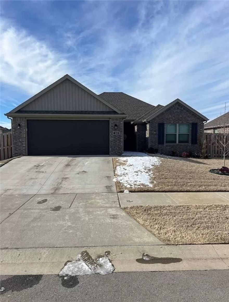 This stunning all-brick 4 bedroom, 2 bath home features a spacious split floor plan with a cozy gas fireplace and elegant crown molding in the living room and primary suite.  the kitchen boasts stainless steel appliances, a pantry, and stylish finished throughout.  The primary suite offers a relaxing whirlpool tub, separate shower, and double vanity.  Additional highlights include a utility room, garage door opener with keypad entry, pull-down attic storage, and energy-efficient features.  Step outside to a covered patio perfect for outdoor entertaining!