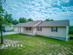 Check out this like-new & well kept home in the Bergman School District! This 3BR/2BA home sits on almost 1 full acre & has a nice view of the Ozark hillsides off the back! Large Living Room with Lifeproof vinyl flooring feeds into a nice Kitchen/Dining Room combo in which all the like-new appliances will convey! Kitchen/Dining Room has new Lifeproof vinyl flooring installed to match the Living Room. Home has been freshly painted throughout & the Guest Bathroom has dual sinks perfect for kids or guests! Outside the property boasts a newer wood deck to take in that wonderful view & on the front has a long covered front porch as well as a large, attached 2-car garage!