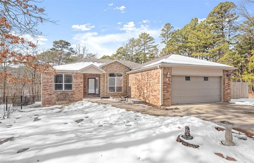 Fantastic location just minutes from shopping, restaurants and Bella Vista POA recreational amenities like golf, tennis, swimming, pickleball, country club and MORE! Tunnel Vision, Technical Difficulty and the new OZ mountain biking gondola are SO close! This home sits on a large fairly level lot with full wrought iron fenced yard and oversized covered back deck. Area is very private with no immediate neighbors! Floorplan is split with an eat in kitchen and formal dining area. Primary bedroom has direct access to outdoor area. 2023-2025 renovation includes full kitchen remodel with gas cooktop and other appliance upgrades, new lvp flooring and fresh paint throughout, tankless water heater and MORE! New refrigerator and stackable washer and dryer convey. Don't miss your chance to own this one!