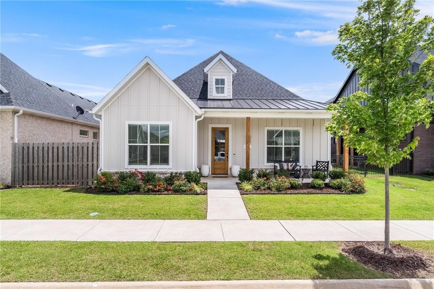 Welcome to 6741 Garden Trail Ave — where everyday comfort meets elevated living in the heart of Northwest Arkansas. This beautifully designed 3-bedroom, 2-bath home offers 2,099 square feet of thoughtfully crafted space, perfectly blending modern elegance with everyday functionality. From the moment you enter, you're welcomed into an open-concept layout that flows effortlessly into a sunlit living area and a chef’s kitchen—complete with premium appliances, a walk-in pantry, and expansive counter space ideal for entertaining or everyday meals. The primary suite is a private escape, featuring a spa-style bath and a generously sized walk-in closet. Two additional bedrooms and a full bath offer comfort and privacy for family or guests. A versatile flex room adds even more value—perfect as a home office, playroom, workout space, or creative studio. Whether you're working from home or need a quiet retreat, this flexible area adapts to your lifestyle.