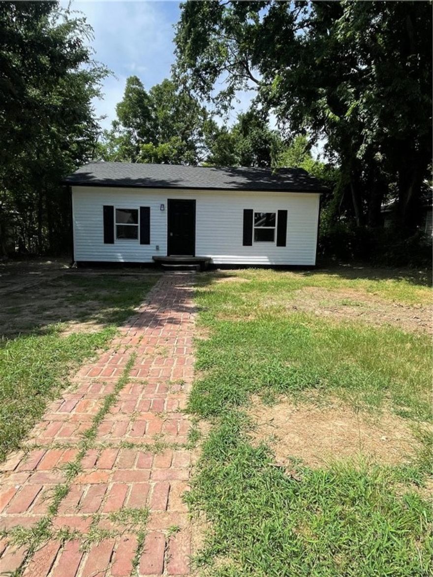 Cute cozy completely remodeled home. 2 bedrooms, 1 bathrooms home with some new appliances, new flooring, new paint, new bathroom, new electrical, new plumbing, new central heat and air, new roof, new tankless water heater. Located in the heart of Russellville